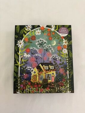 Galison 1000 piece puzzle  "Bloomarium". 
Finished size 27" x 20". EUC.